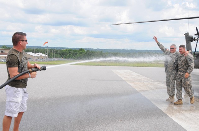 Family members help celebrate Aviation pioneer's final flight