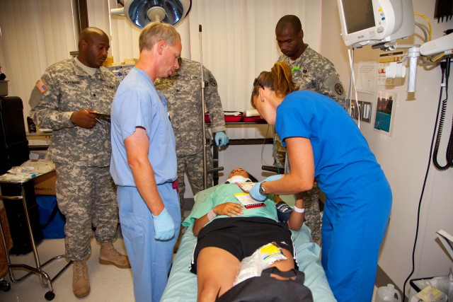 Tripler's staff care for mock casualties during MASCAL exercise Operation Chianti