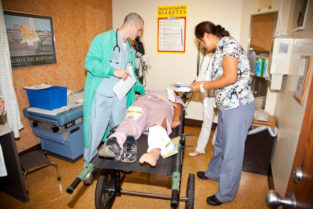 Tripler's staff care for mock casualties during MASCAL exercise Operation Chianti