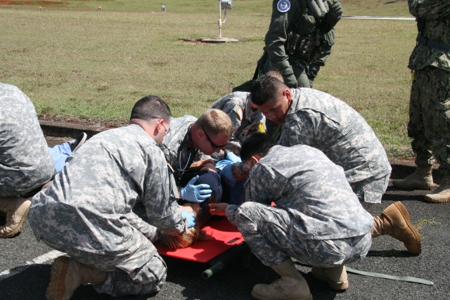 Tripler's staff care for mock casualties during MASCAL exercise Operation Chianti