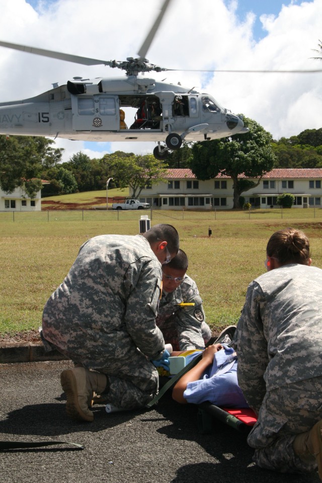 Tripler's staff care for mock casualties during MASCAL exercise Operation Chianti