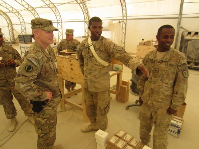 Brig. Gen. David Clarkson visits the 18th CSSB retrograde yard in Kandahar Airfield