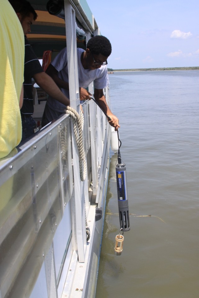 High school students test water quality in the Savannah Harbor