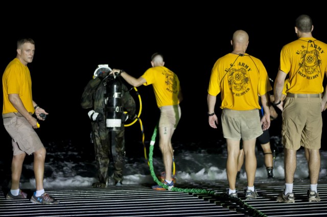 Combat Divers Practice in the Deep Blue
