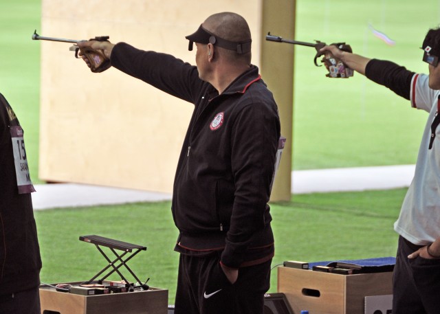 Szarenski shoots Olympic 50-meter free pistol