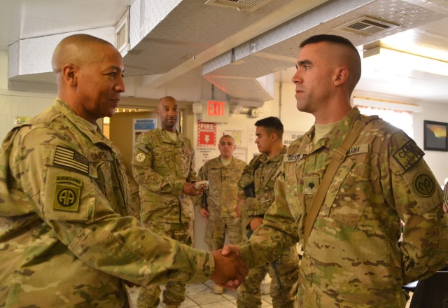 401st Soldiers receive coins from COMISAF Command Sergeant Major