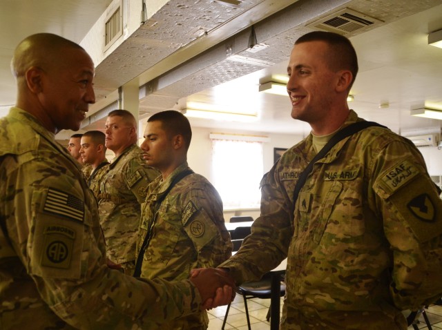 401st Soldiers receive coins from COMISAF Command Sergeant Major