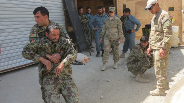 'Wolverine' medics train Afghan counterparts to perform proper life-saving skills