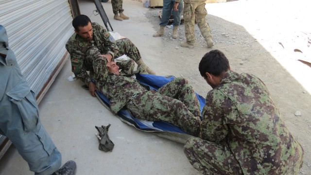 'Wolverine' medics train Afghan counterparts to perform proper life-saving skills