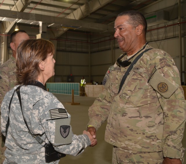 Soldiers receive coins from Brig. Gen. LeDoux