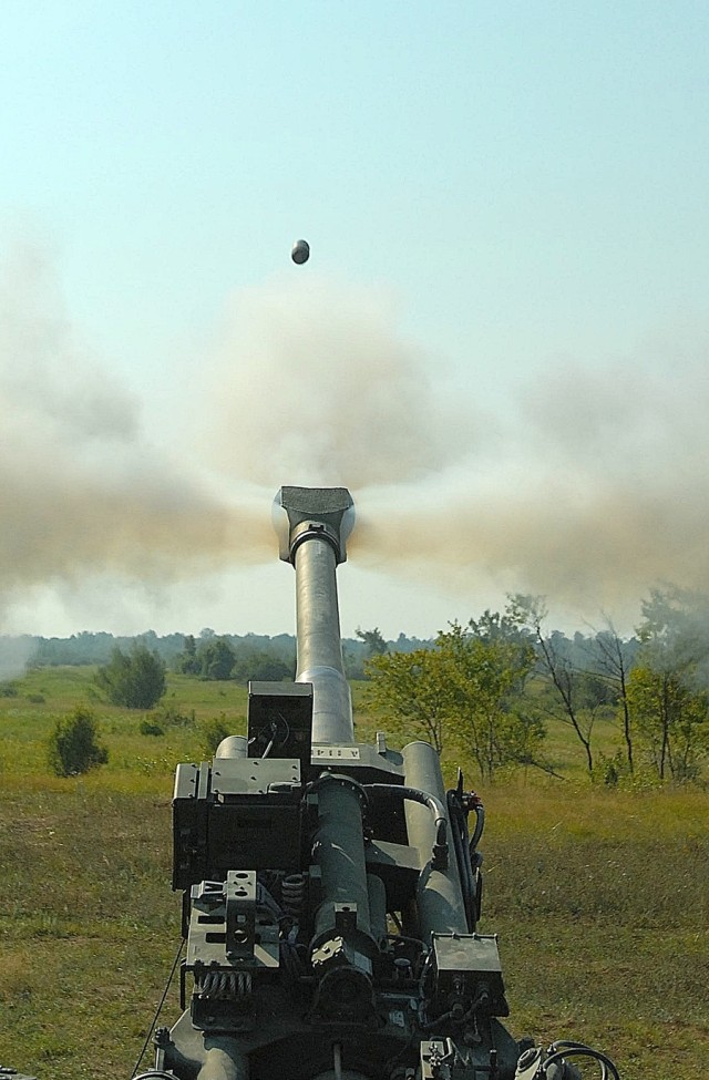 Soldiers of 2-15 FA fire new M777A2 howitzer