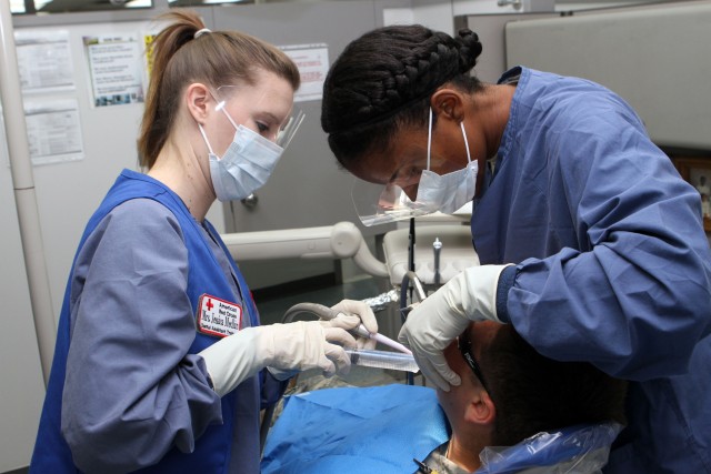 Volunteers help community smile