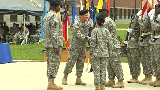 Maj. Gen. Mustion passes HRC colors to Command Sgt. Maj. Lee