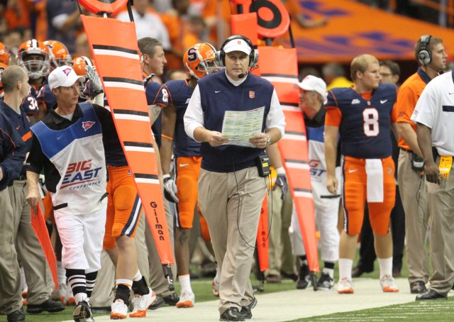 SU Head Coach, Doug Marrone, walks the sideline