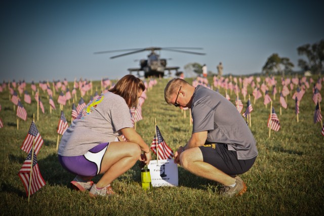 Paying their respects to a fallen comrade