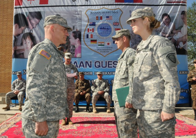 Adjutant General of the Alaska National Guard, presents the Army Commendation