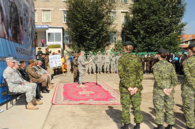 General of the Alaska National Guard, speaks during medical closing ceremony