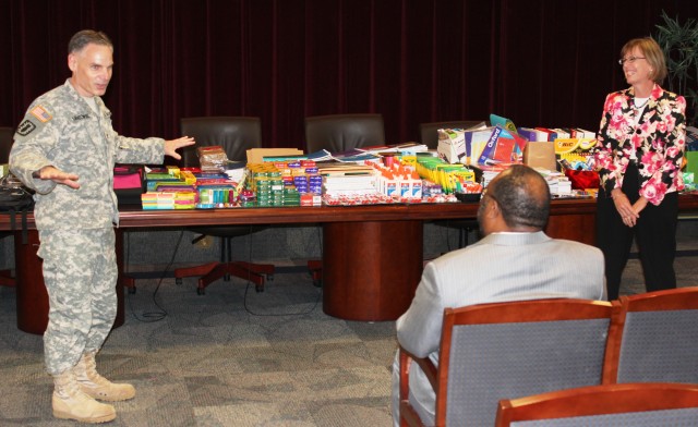 ECBC hosts fifth annual back-to-school drive hand-off ceremony