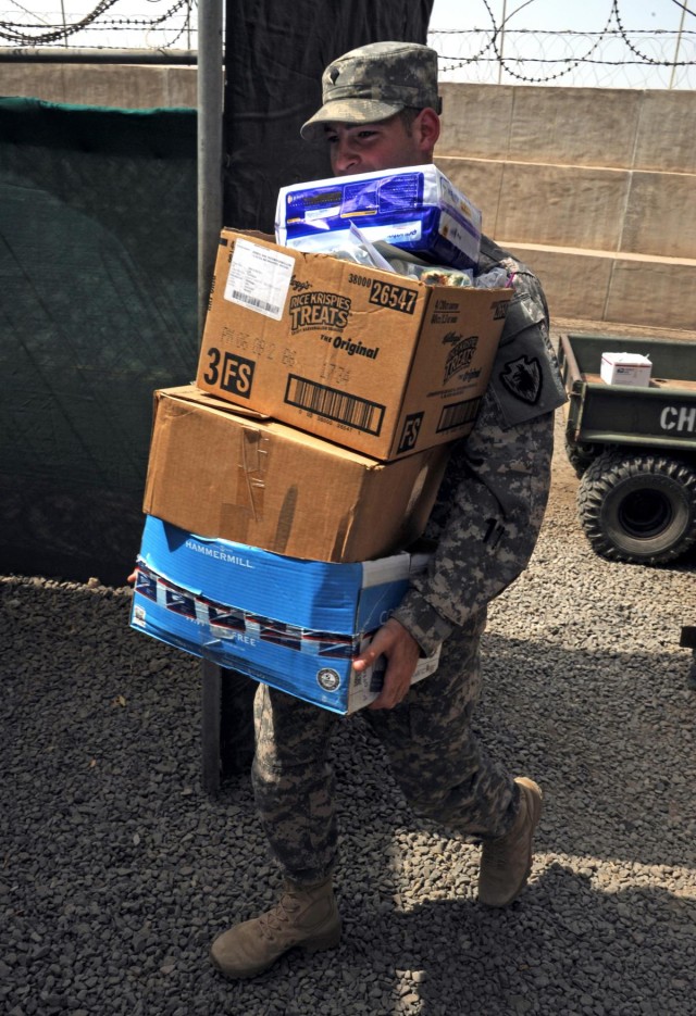 CJTF-HOA members deliver 'care' to orphanage