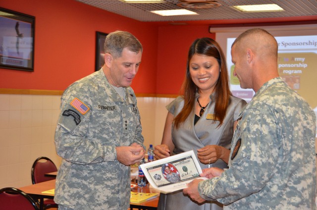IMCOM Commander, Lt. Gen. Michael Ferriter and Command Sgt. Maj. Earl Rice visited the Vicenza Military Community Aug. 14. They visited numerous facilities recognizing exemplary employees and spoke to