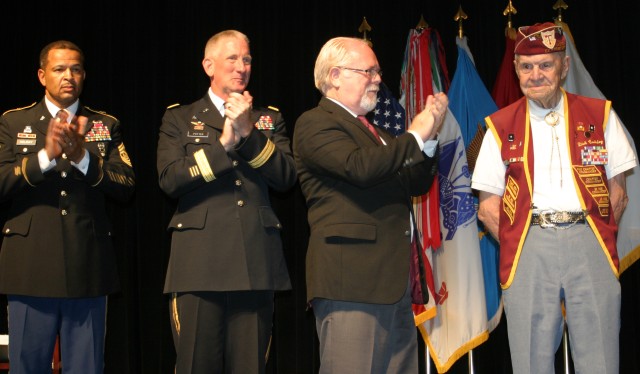 From left, Command Sgt. Maj. Todd Holiday, Military Intelligence Corps command sergeant major, Maj. Gen. Gregg Potter, commanding general, U.S. Army Intelligence Center of Excellence and Fort Huachuca