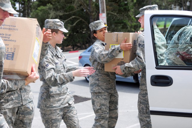 Community gathers to pack boxes for deployed troops