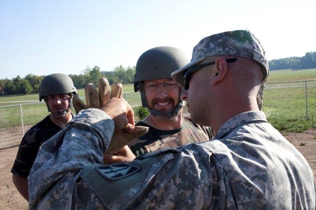 Soldiers, NHRA race team swap roles