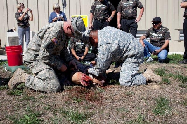 Soldiers, NHRA race team swap roles