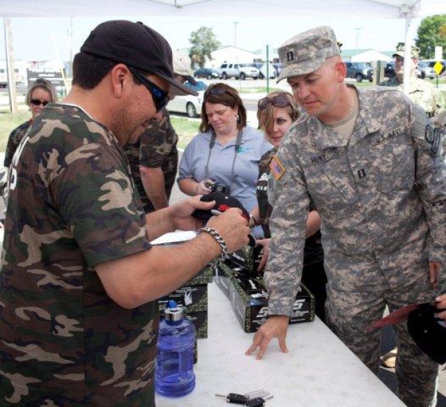 Soldiers, NHRA race team swap roles