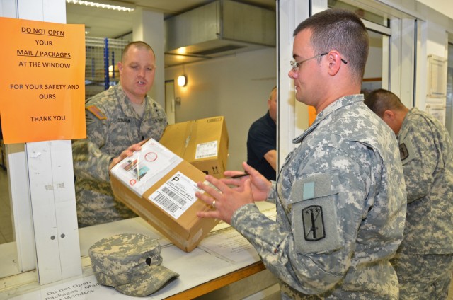 Commander helps out at community mail room