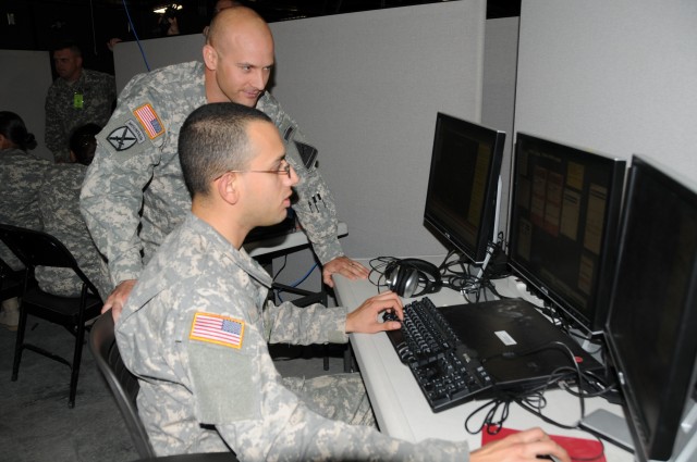 Soldiers training on Mission Command systems in garrison
