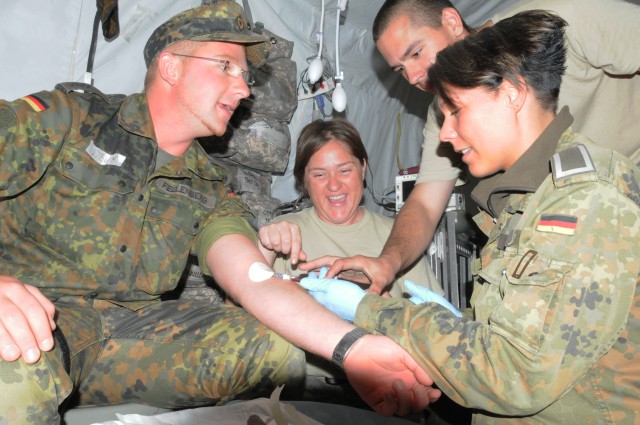US, German, British medical troops learn from one another during exercise