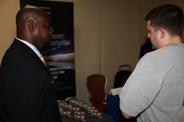 Employers and Applicants discuss opporutunities