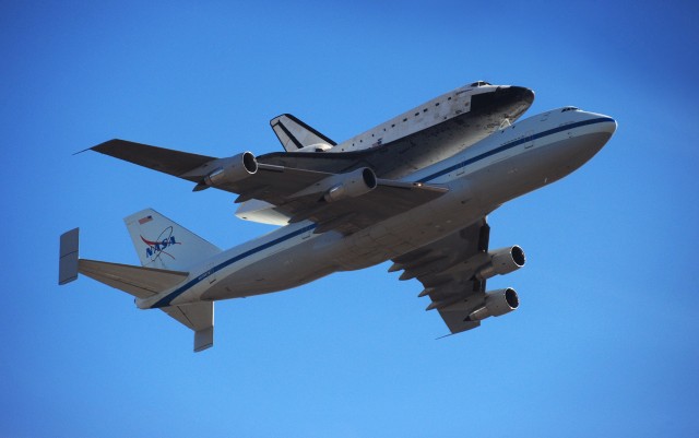 Space Shuttle Endeavour flies over of Presidio of Monterey