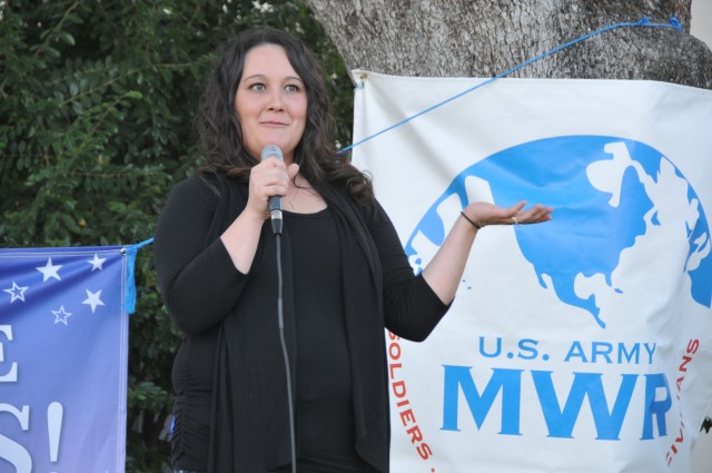 Kayte Allen sings during Operation Rising Star at Fort Hunter Liggett, Calif.