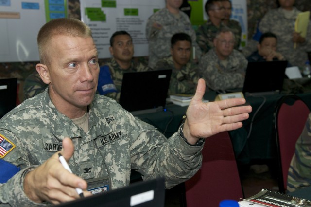 Col. Carden gives feedback during Command Post Exercise