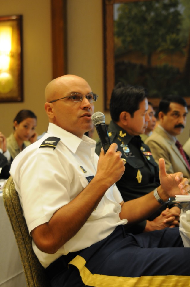 US Army Pacific Director of Intelligence, poses a  question to a speaker