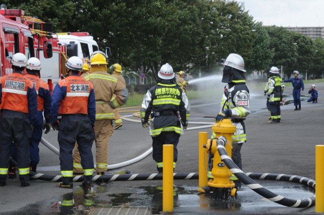 Joint fire drill strengthens bond between Army, city firefighters in Japan