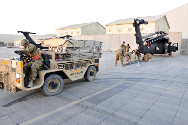 25th CAB loads helicopters on planes