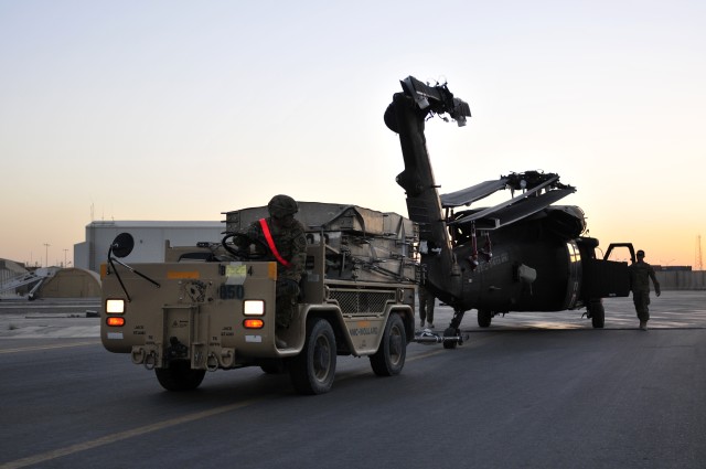 25th CAB loads helicopters on planes