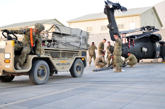 25th CAB loads helicopters on planes