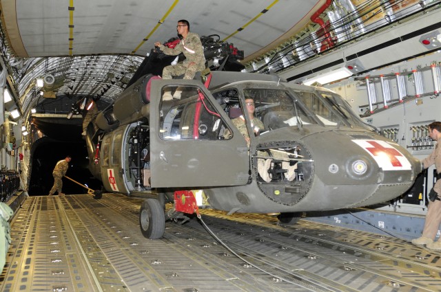 25th CAB loads helicopters on planes