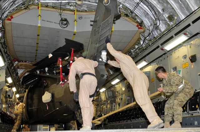 25th CAB loads helicopters on planes