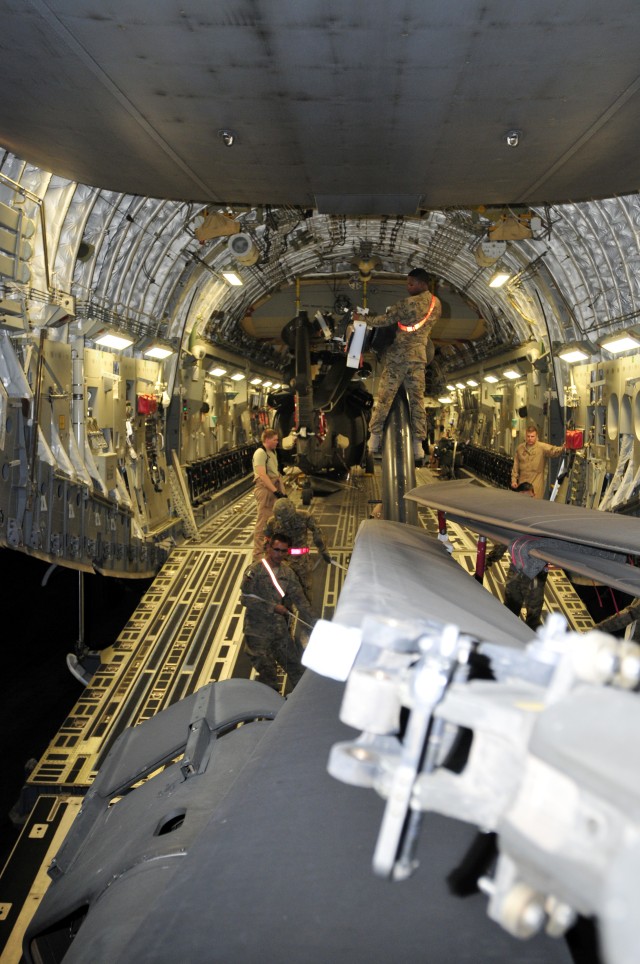 25th CAB loads helicopters on planes