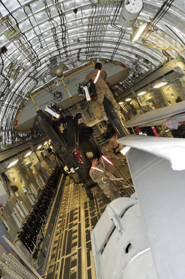 25th CAB loads helicopters on planes