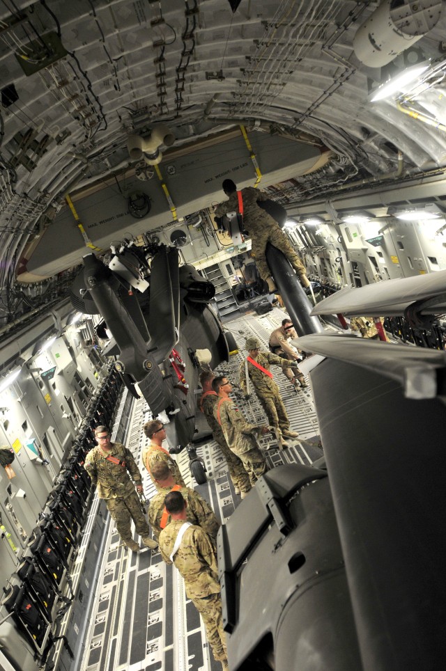 25th CAB loads helicopters on planes