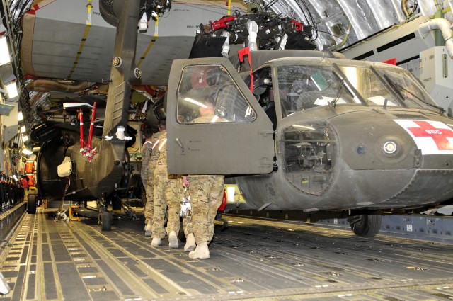 25th CAB loads helicopters on planes