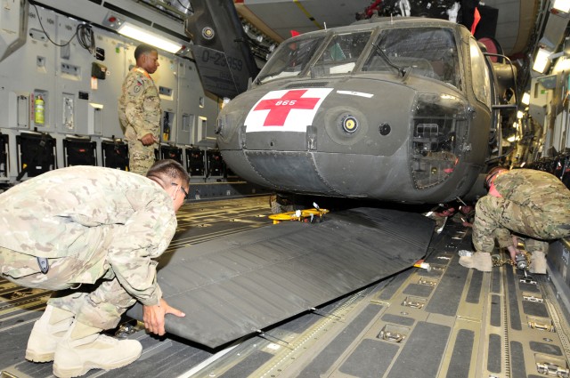 25th CAB loads helicopters on planes