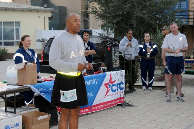 Mentors invite Afghan National Army soldiers to participate in Army Ten-Miler shadow run