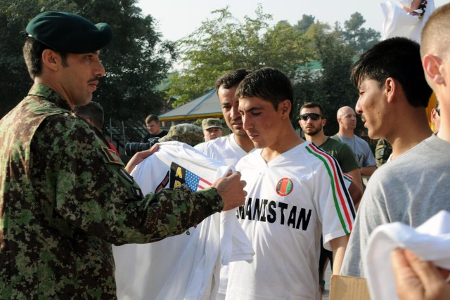 Mentors invite Afghan National Army soldiers to participate in Army Ten-Miler shadow run